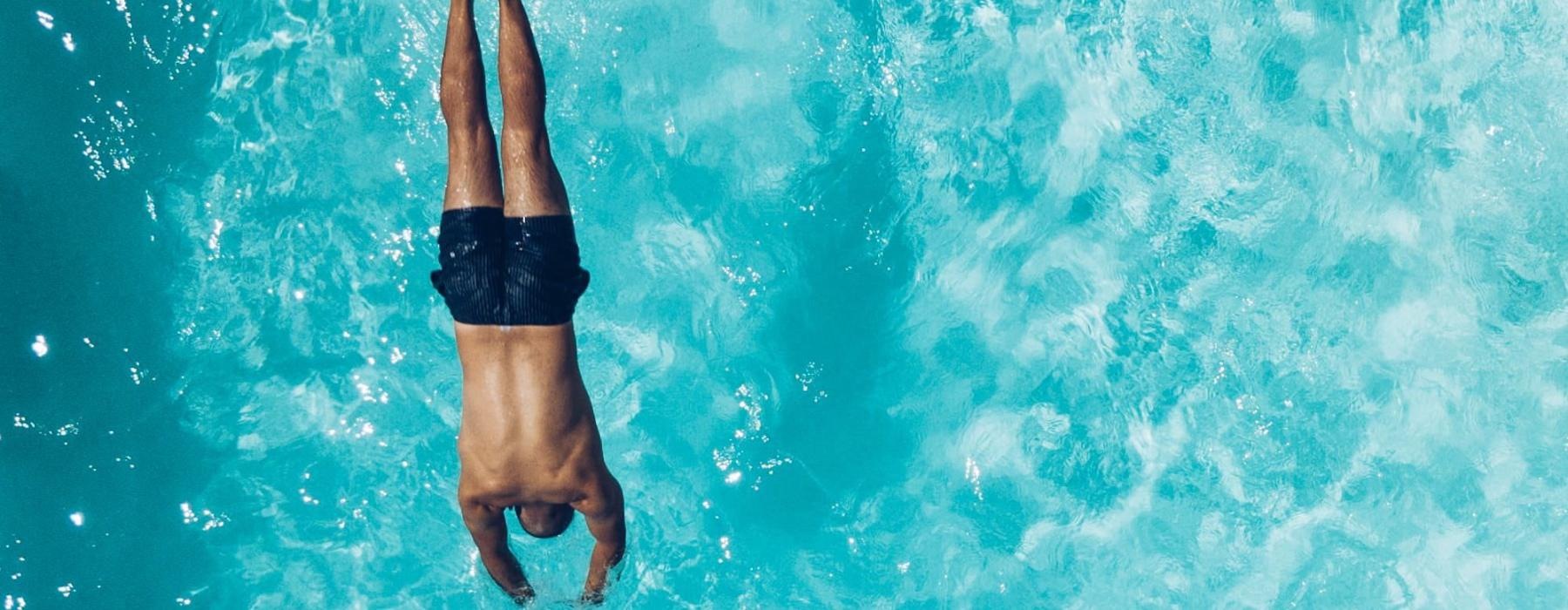 a man swimming in the water